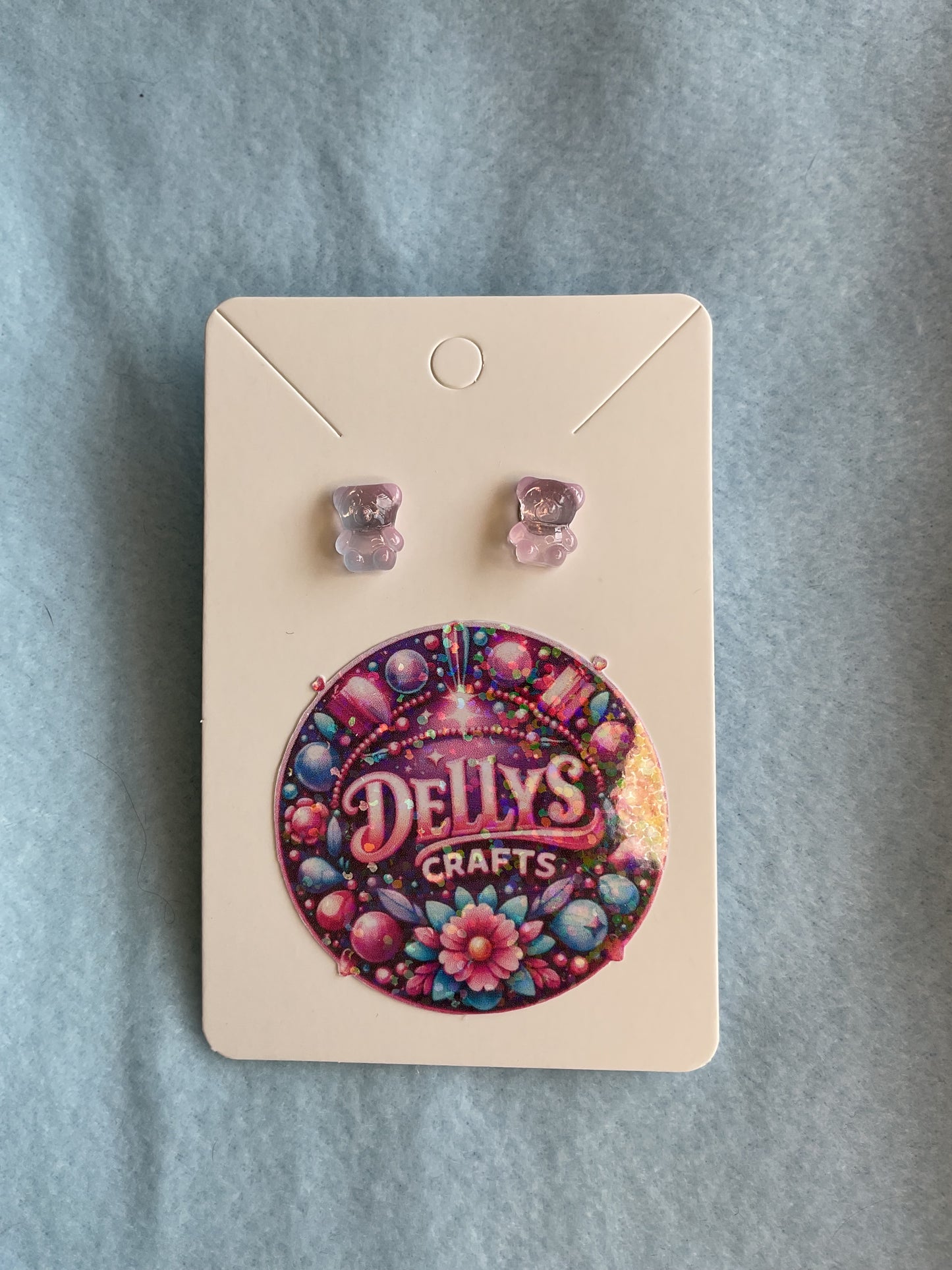 Glass shaped purple tint earrings