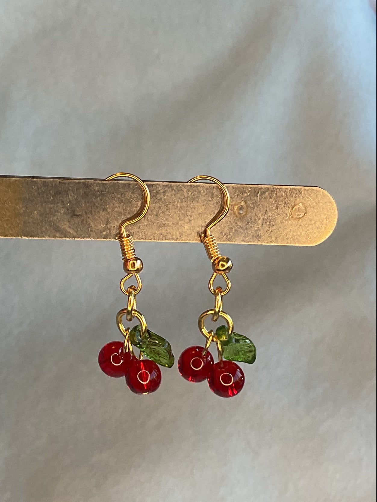 Cherry earrings with gold hardware