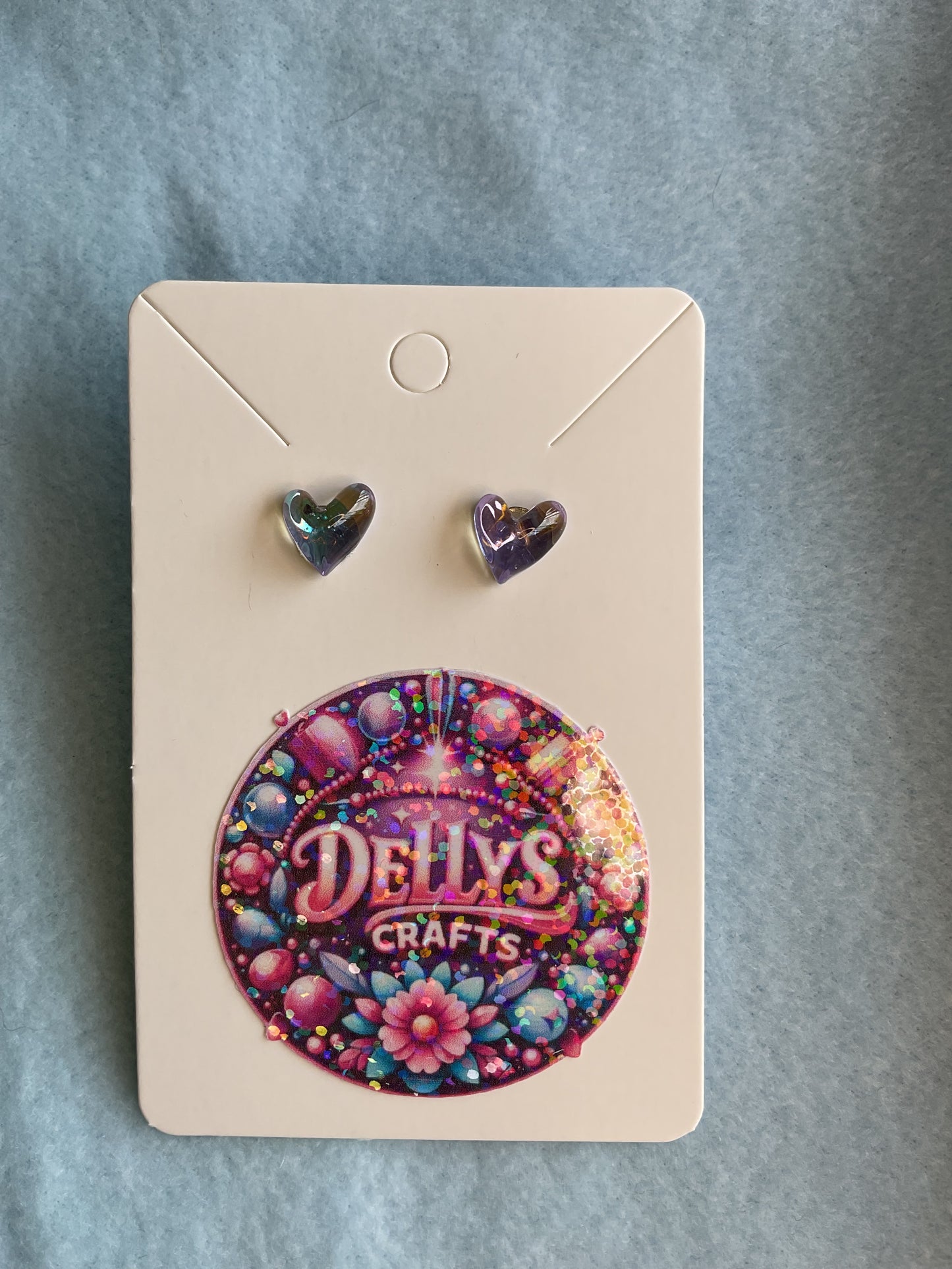 Glass shaped purple tint earrings