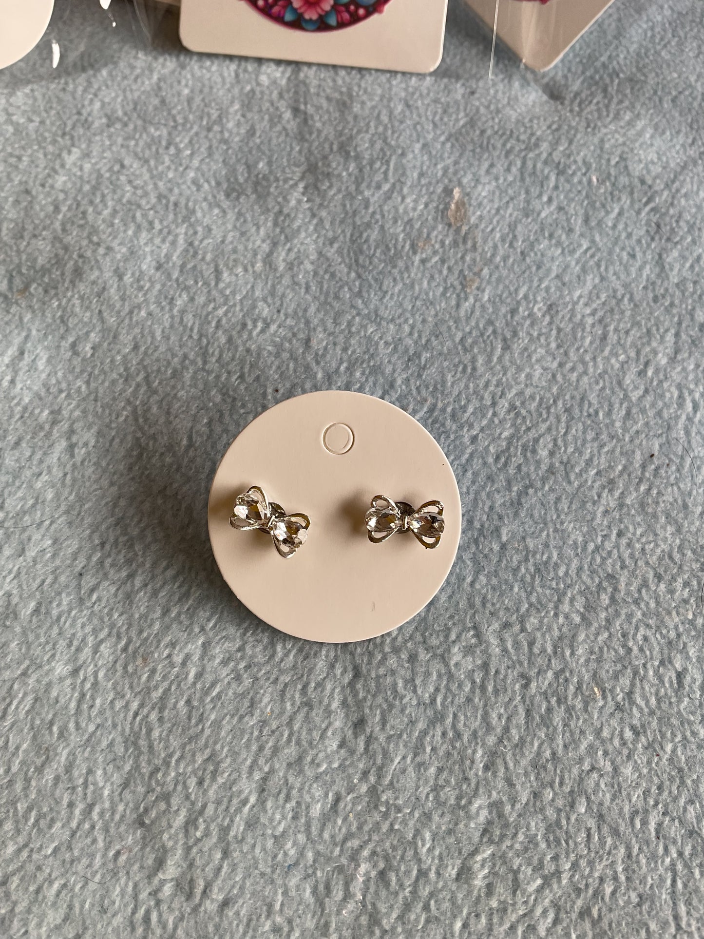 Diamanté bow earrings