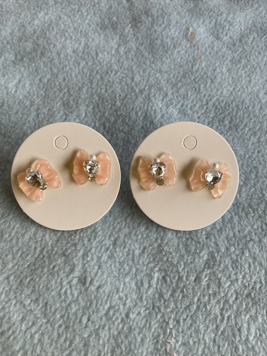 Peach bow earrings